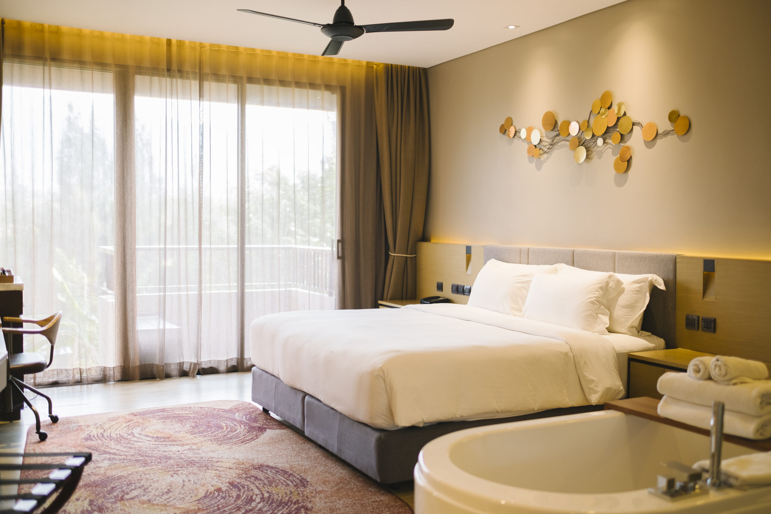 https://dolphinotel.com/wp-content/uploads/2025/06/luxury-bedroom-hotel-scaled.jpg